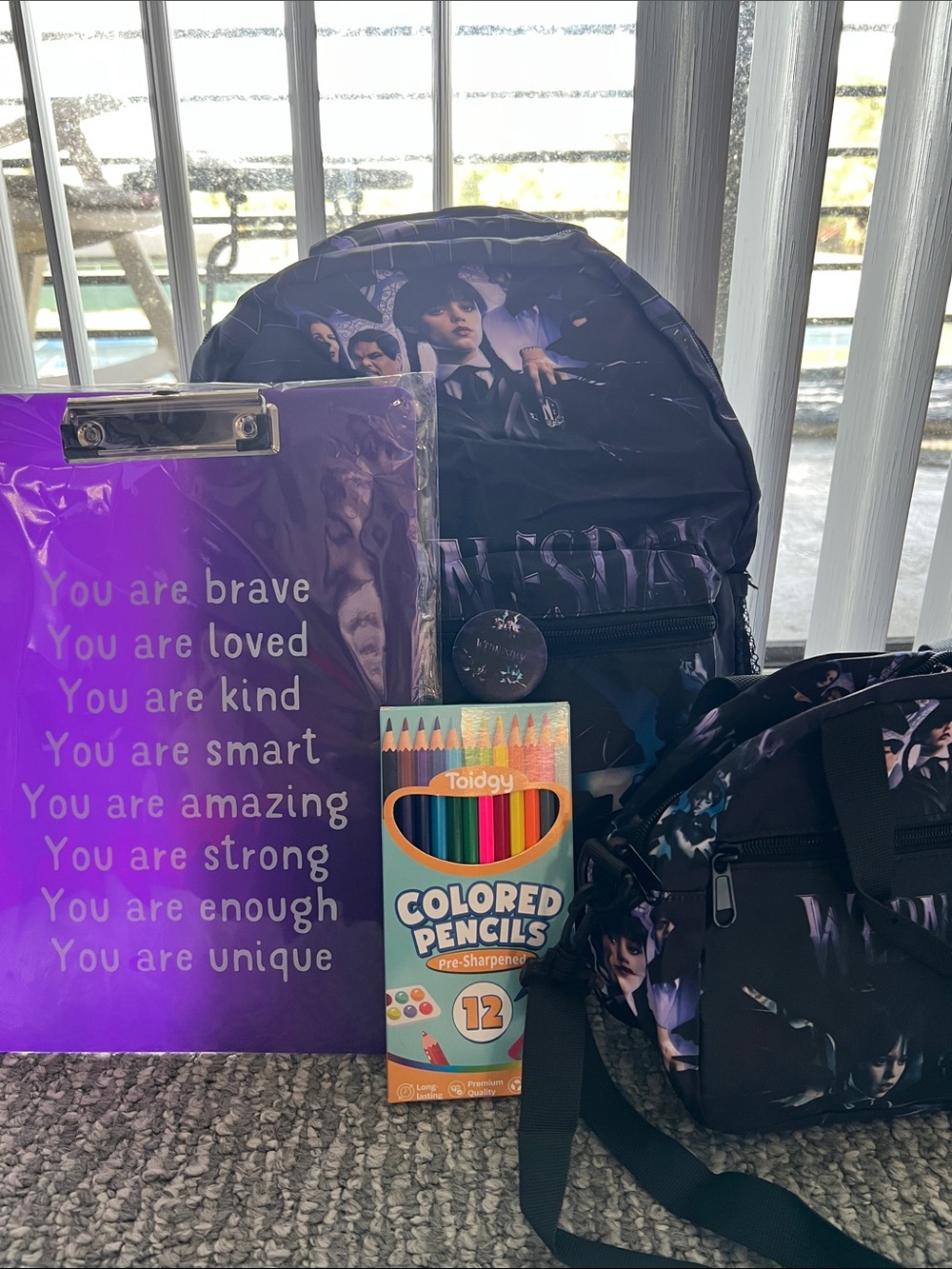 Wednesday 5 Piece Backpack and Lunch Bag, colored pencils, button & Clip Board